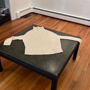 A designer NFP Turtleneck with dolman sleeves